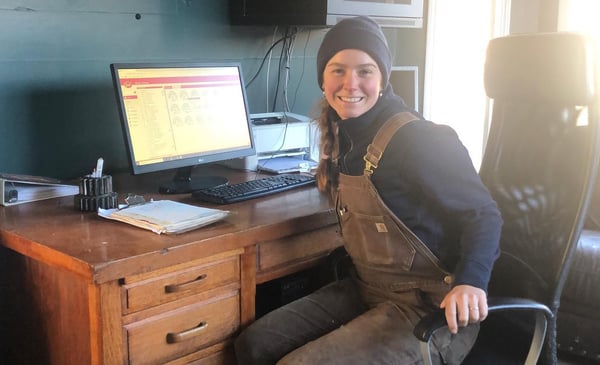 Mickey Aylard working in her office with the Lely T4C management system