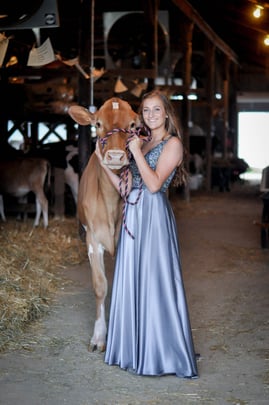 Lely Scholarship Winner Grace Howe with dairy cow