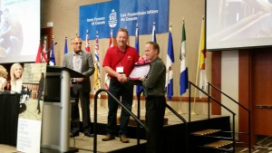 Ken Dykstra wins a Juno automatic feed pusher