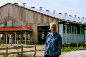 Martin de Groot outside dairy barn