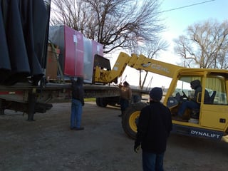 Unloading Lely Astronaut A4 robotic milking machines at the Stam farm.