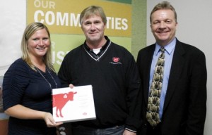 From left to right – Megan Kregel, dairy center coordinator for Northeast Iowa Dairy Foundation, Rick Rugg, regional sales manager for Lely and Dave Lawstuen, chair for dairy operations and dairy science instructor for Northeast Iowa Community College (NICC) 