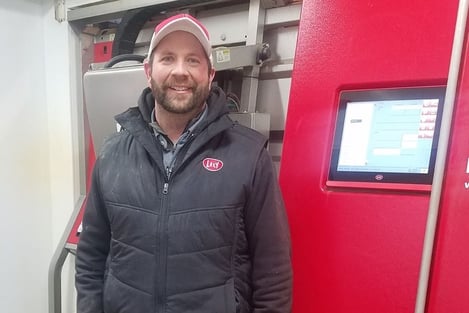 Darin Strauss of Majestic Crossing Dairy with a Lely Astronaut robotic milking machine