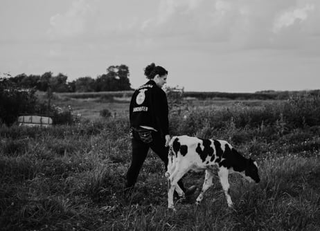 Lely Scholarship Winner Sarah Metzger with dairy cow