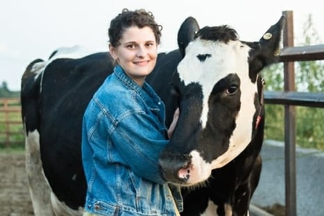 Lely Scholarship Winner Sarah Metzger with dairy cow