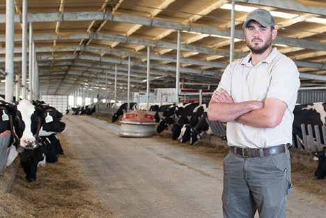 Kevin Cornett of Sweetwater Valley Farm in his robotic dairy barn.