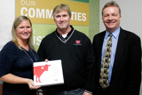 From left to right – Megan Kregel, dairy center coordinator for Northeast Iowa Dairy Foundation, Rick Rugg, regional sales manager for Lely and Dave Lawstuen, chair for dairy operations and dairy science instructor for Northeast Iowa Community College (NICC).