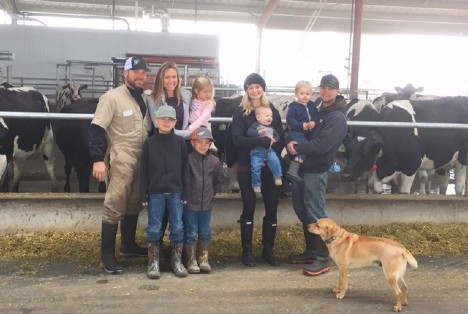 Pete Postma and Sons Dairies in front of their new Lely robotic milking machines.